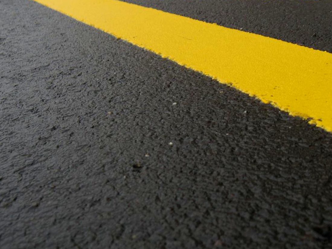 Fresh sealcoated asphalt — sealcoating service in Greenbrier, AR